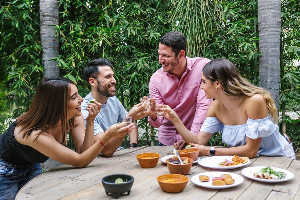 Family spending time together outdoors in Medellín, Colombia